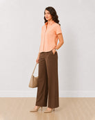 Ariana peach 100% slubbed cotton formal shirt, angled front view with half sleeves