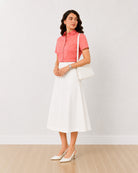 Ariana pink slubbed cotton half sleeves shirt front view with the curved hem