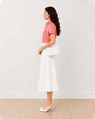 Ariana pink slubbed cotton formal shirt side profile with the curved hem