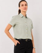 Ariana sage green cotton shirt waist up front with the half sleeves