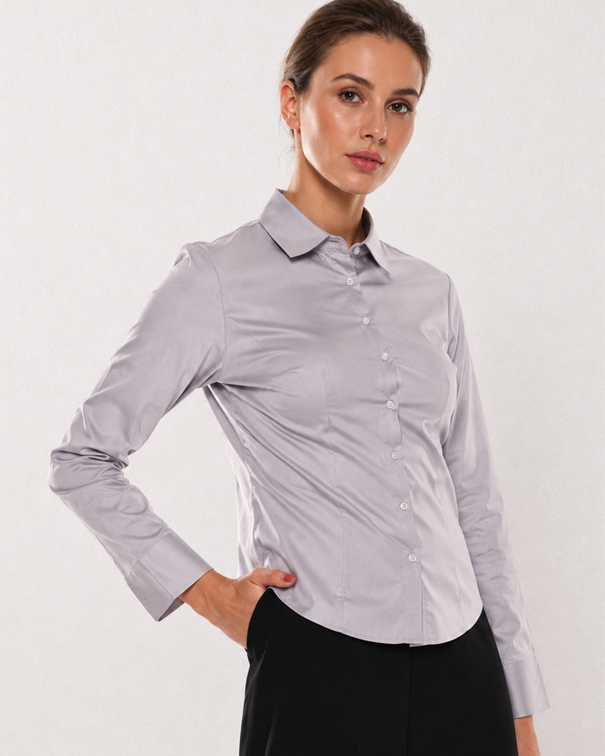 Armani light grey cotton satin shirt waist up angled with the curved hem