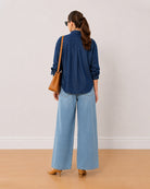 Athena indigo denim oversized shirt back view with the gathers at the yoke