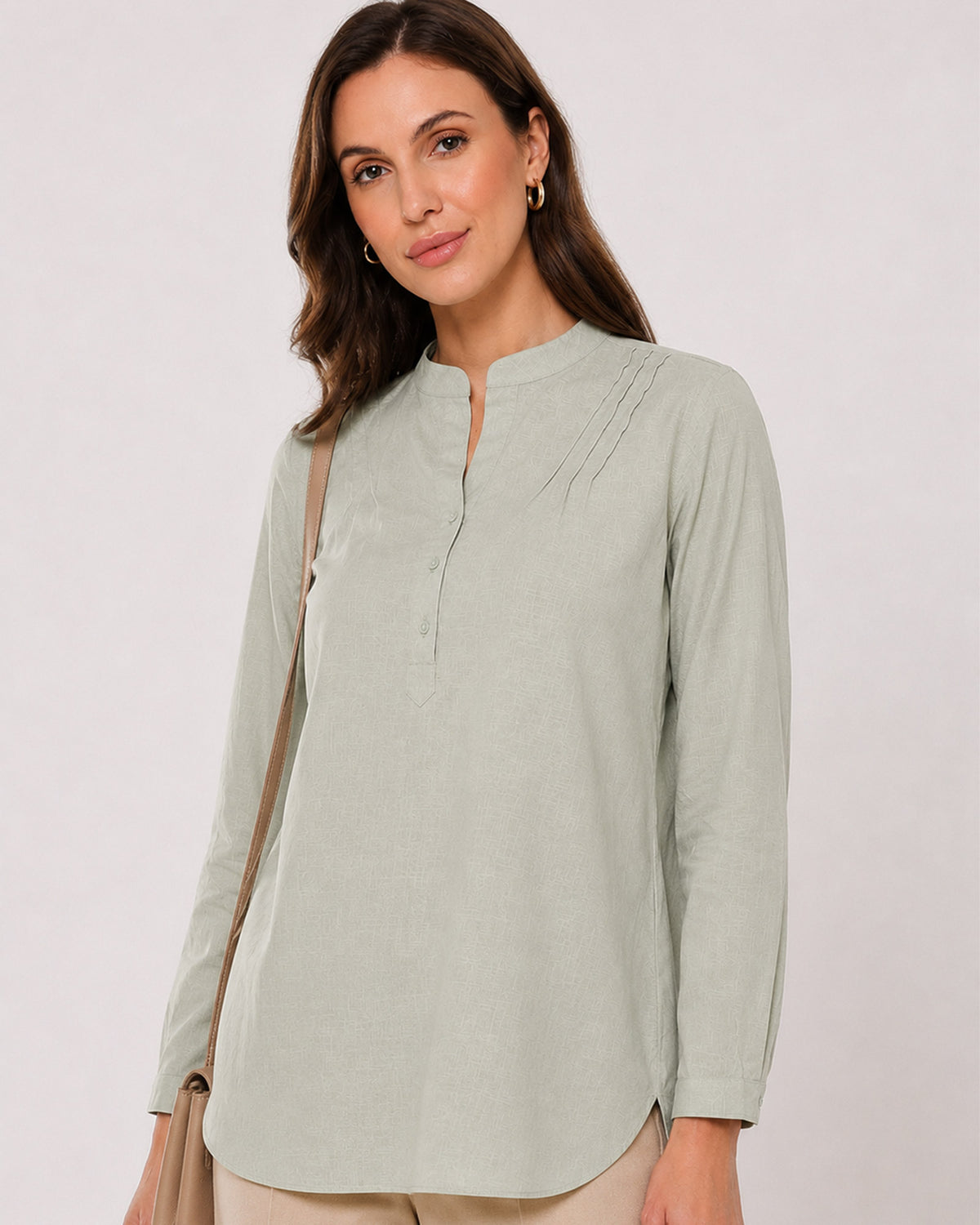 Audrey sage green cotton tunic shirt waist up front with the half placket