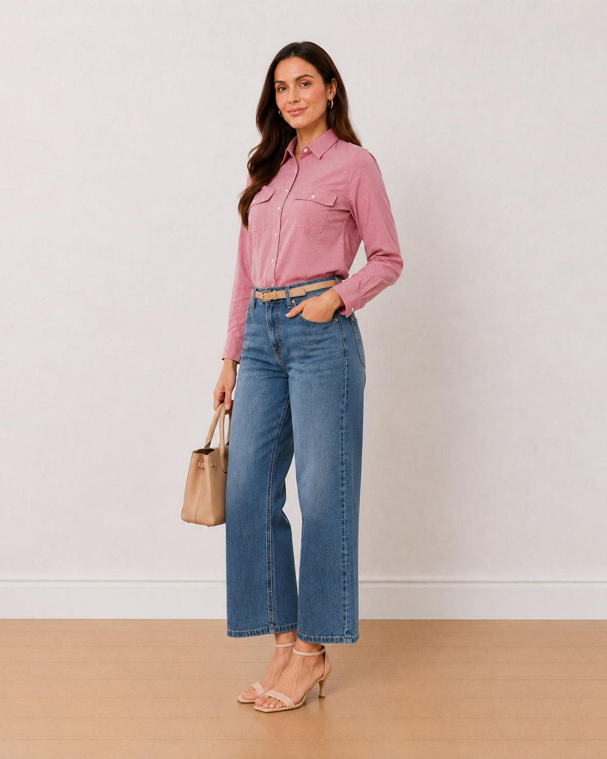 Aura pink 100% cotton chambray utility shirt, angled view with the curved hem