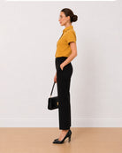 Avony mustard yellow formal half sleeves shirt side profile with the curved hem