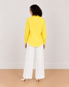 Bali bright yellow cotton shirt back view with drop shoulder and the long curved hem