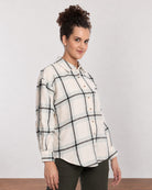 Barbara sage green brushed cotton checks shirt, angled front view with the curved hem