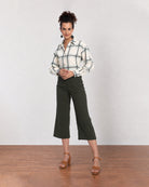 Barbara sage green brushed cotton checks shirt worn loose with the long curved hem