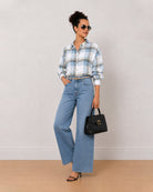 Beatrice powder blue brushed cotton checks shirt worn loose with the curved hem