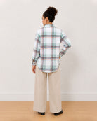 Beatrice sage green checks shirt back view with the long curved hem and drop shoulder