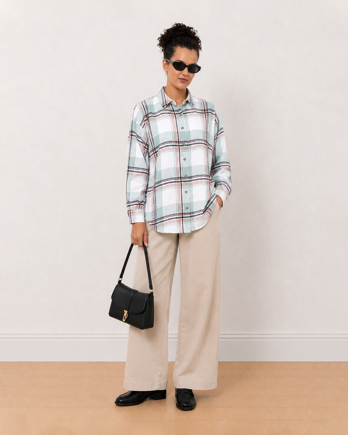 Beatrice sage green brushed cotton checks shirt worn loose with the long curved hem