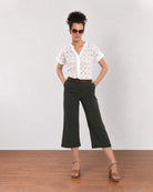Gazillion Belinda white schiffli cutwork lace top for women, full length front view with the curved hem