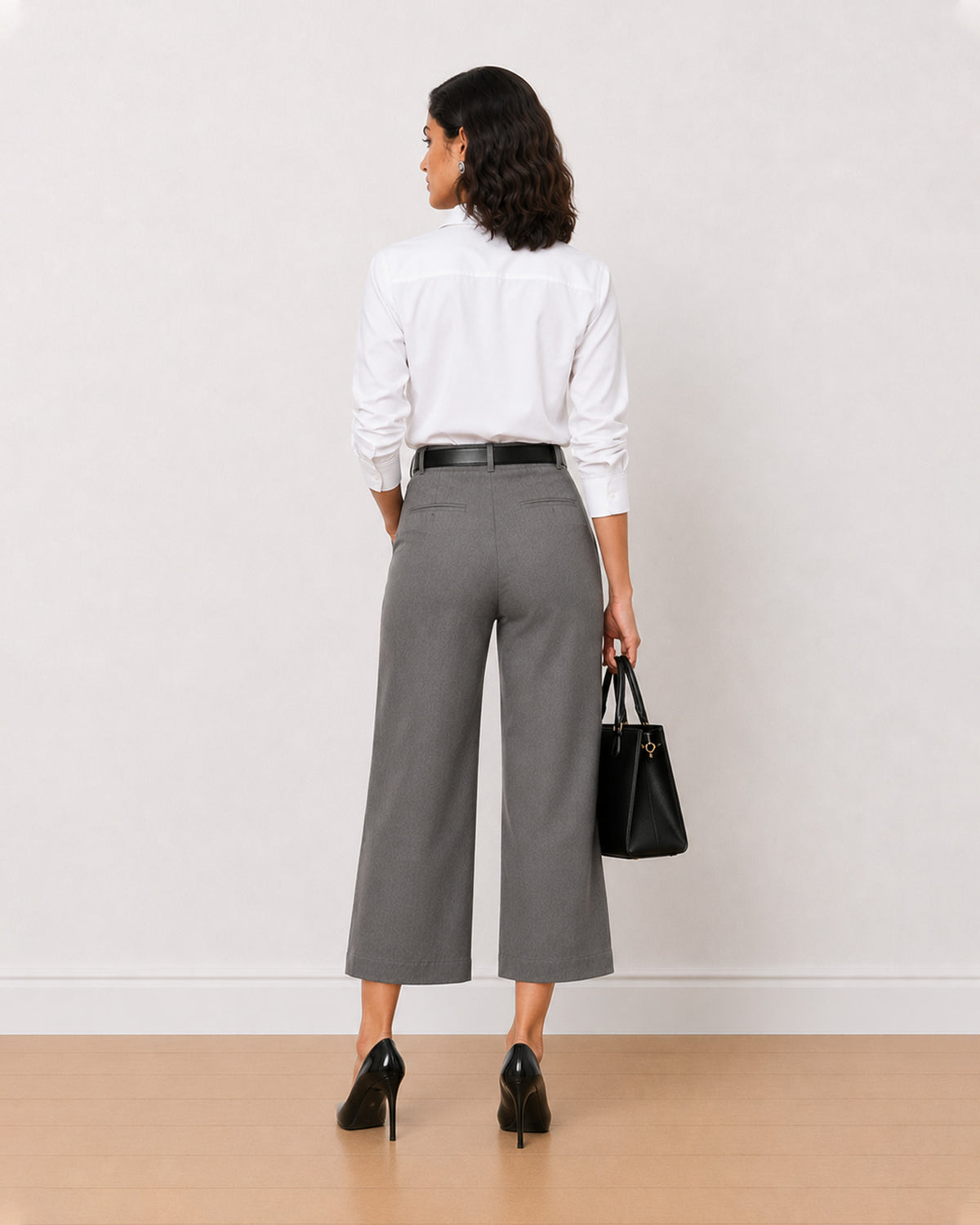 Bella grey 3/4th straight pants back view with the medium waist and straight leg