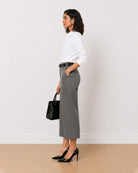 Bella grey medium waist 3/4th straight pants, side view with the mid calf hem