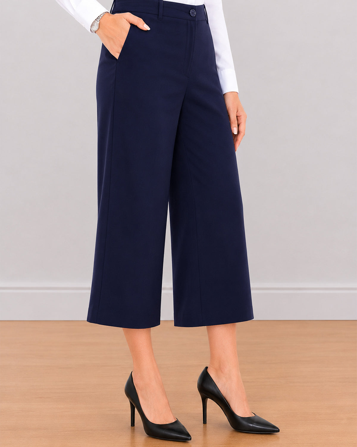 Bella navy blue pants waistband with button and zip opening, belt loops and wide leg