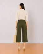 Bella olive green 3/4th straight pants back view with medium waist and straight leg