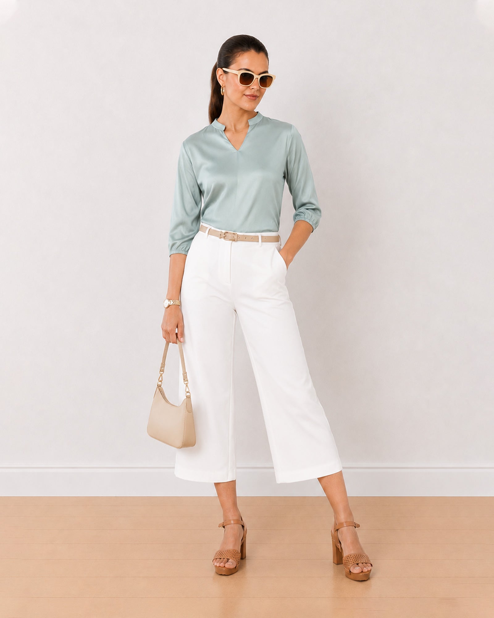 Gazillion Bellina sage green twill viscose loose top for women, full length front view with the curved hem