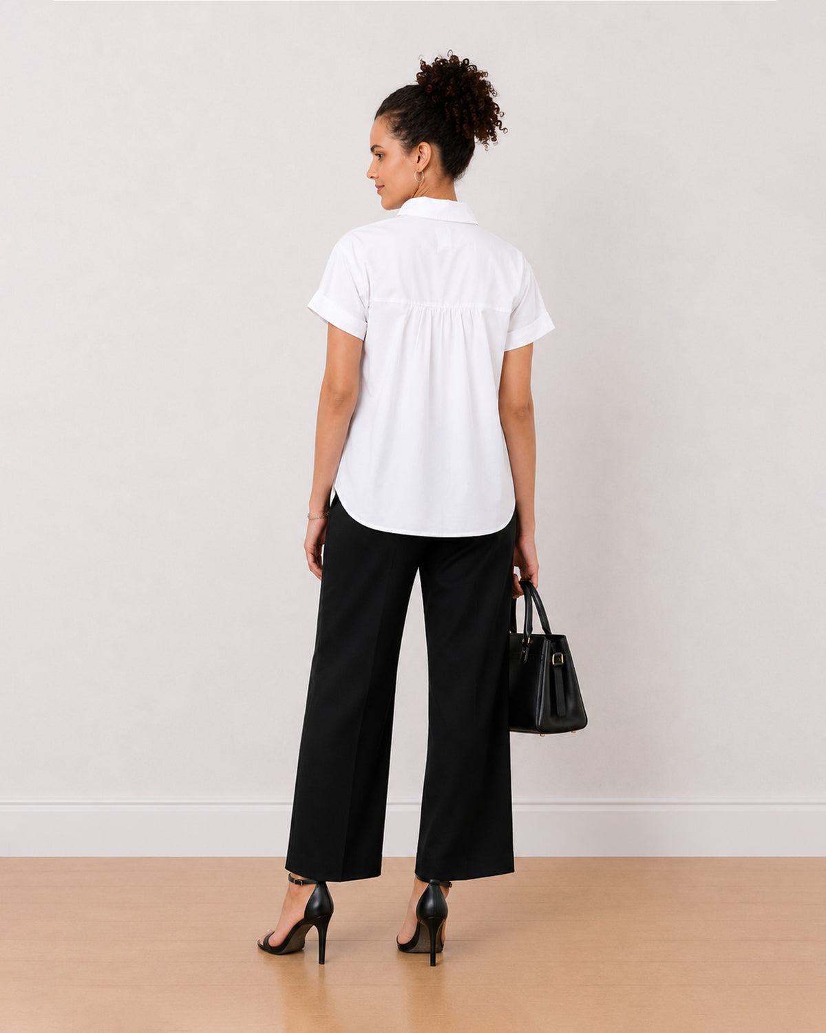 Bershka white shirt back view with gathers at the back yoke for ease of movement