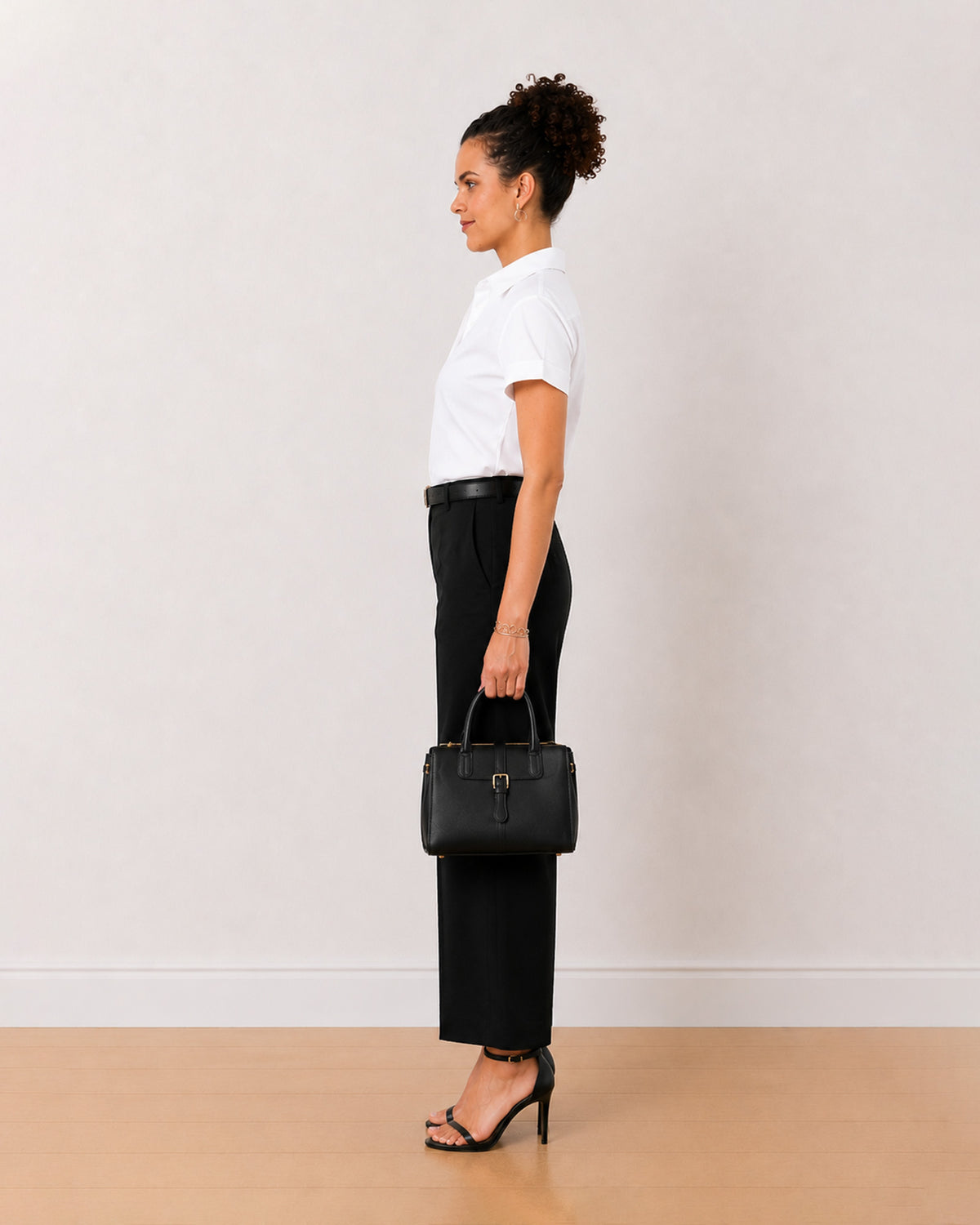Bershka white oxford cotton shirt side view with the curved hem and boxy fit