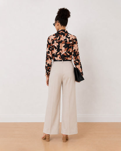 Bethany black floral print cotton shirt back view with the centre back pleat
