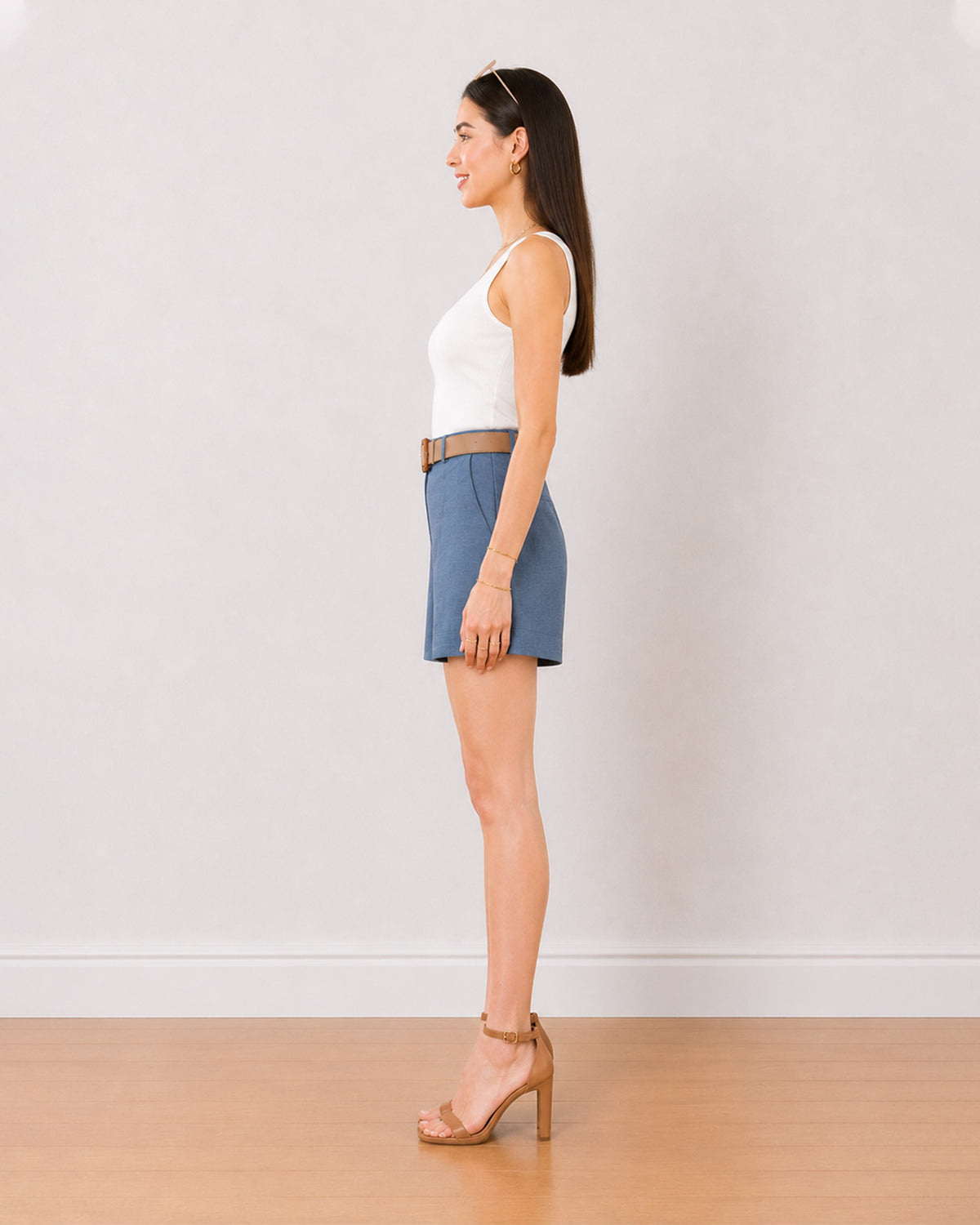 Blair denim blue high waisted summer shorts side view with the mid thigh length