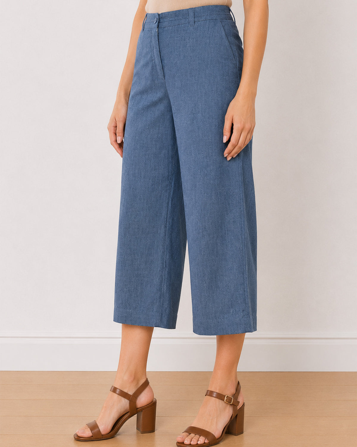 Bliss denim blue 3/4th straight pants front detail with the wide mid calf leg