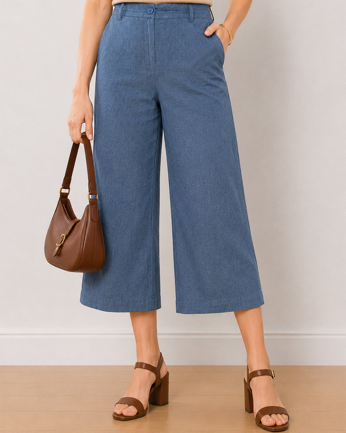 Bliss denim blue pants waistband with button and zip opening, belt loops and pocket