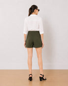 Bobby olive green medium waist shorts back view with the mid thigh hem