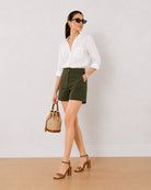 Bobby olive green loose fit summer shorts, front view at the mid thigh length