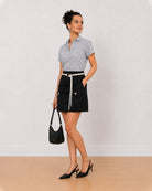 Bronze black and white striped shirt, angled front view with ease of movement
