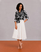 Brooke black and white abstract print viscose linen shirt worn loose, front view