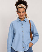 Brynn light blue denim shirt front detail with hidden dignity buttons inside the placket