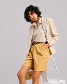 Caleb light grey viscose linen formal shirt for women, angled front view worn tucked in