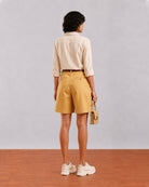 Back view of Caleb light grey shirt showing centre back pleat for ease of movement