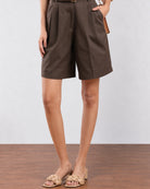 Camila olive green shorts front detail with pleated front and side pocket in 100% cotton