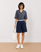 Gazillion Carrie indigo blue denim knee length bermuda shorts for women, full-length front view