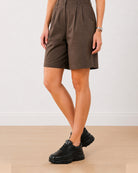 Carter chocolate brown cotton twill city shorts detail with pleated front and knee length hem
