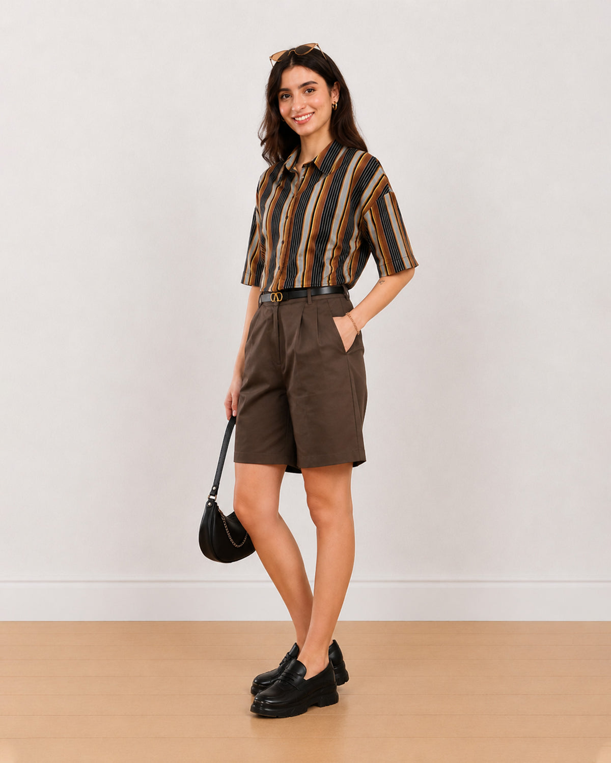 Carter chocolate brown knee length shorts front view with hand in side cross pocket
