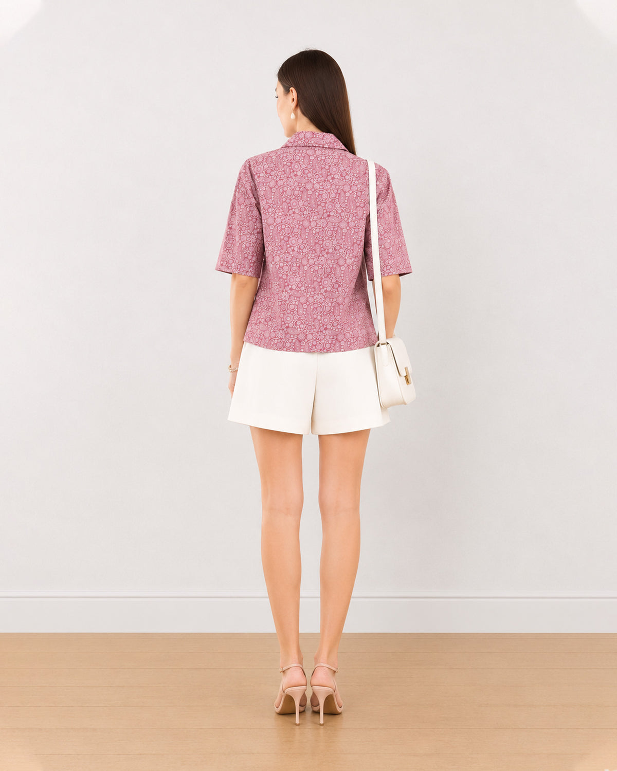 Back view of Casey onion pink printed cropped shirt showing back yoke and straight hem