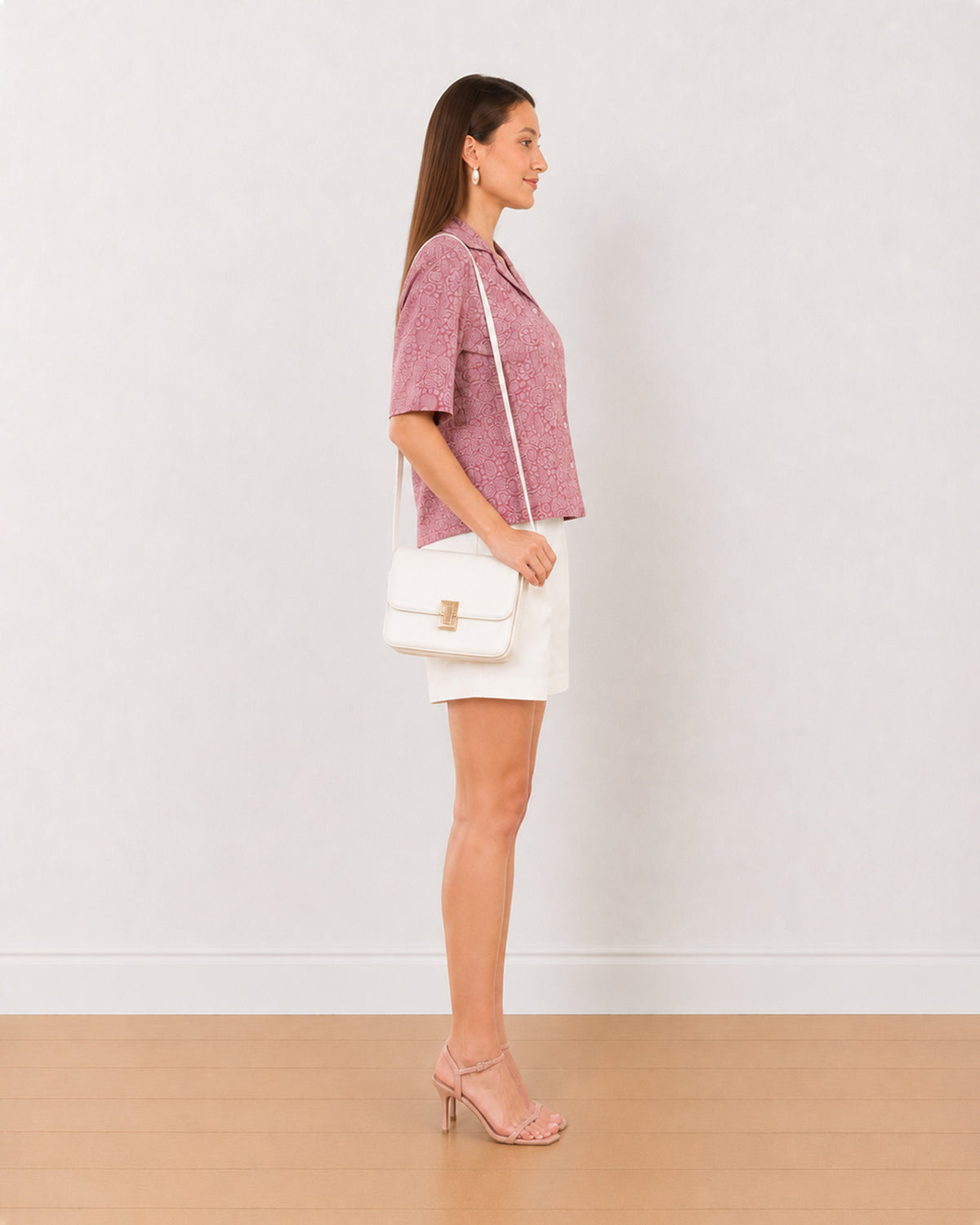 Side view of Casey onion pink paisley print cropped shirt in 100% cotton, worn untucked