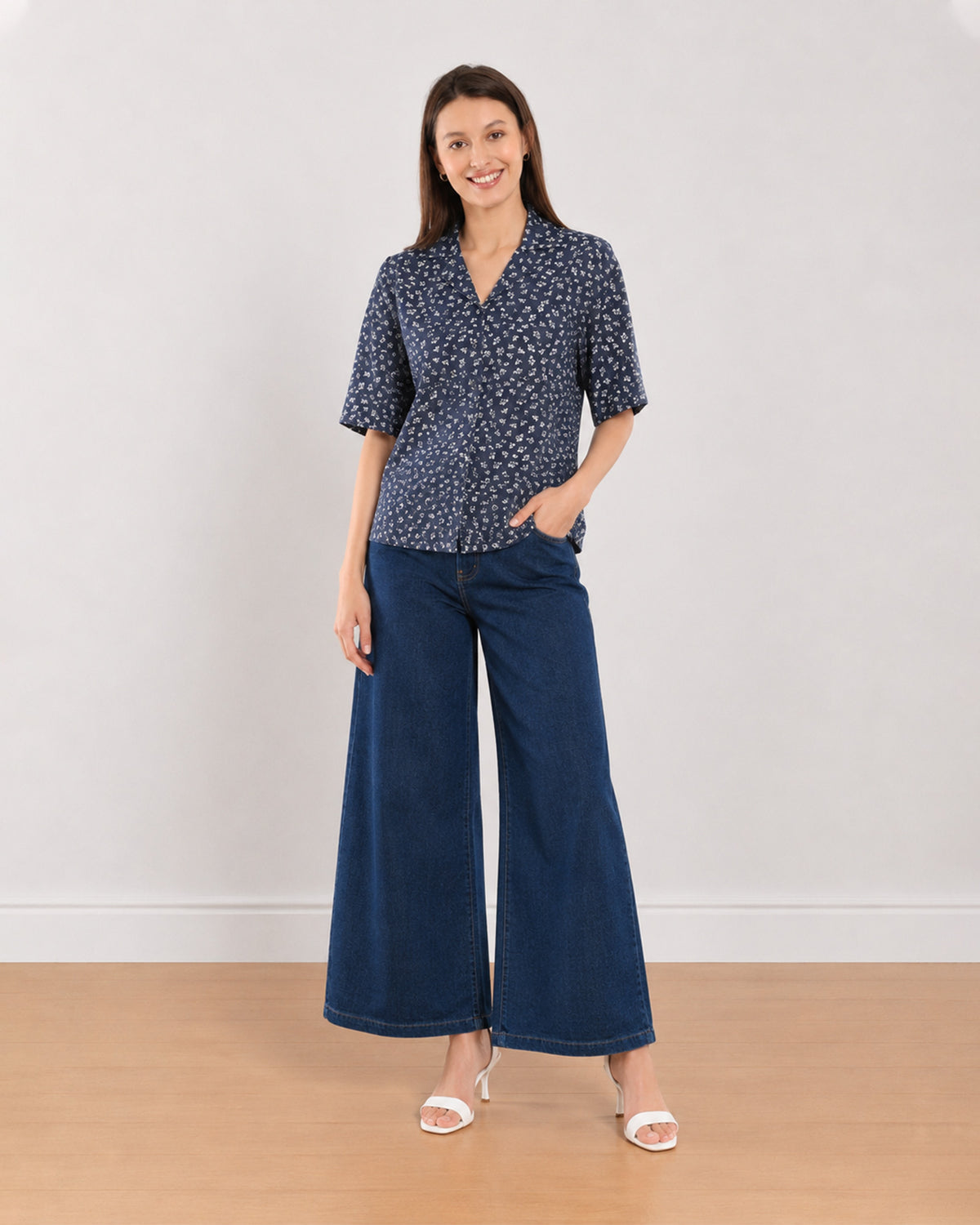 Cece indigo floral print cropped shirt angled front view with a boxy relaxed fit