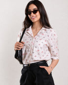 Cecelia white printed cropped shirt angled front view worn tucked in