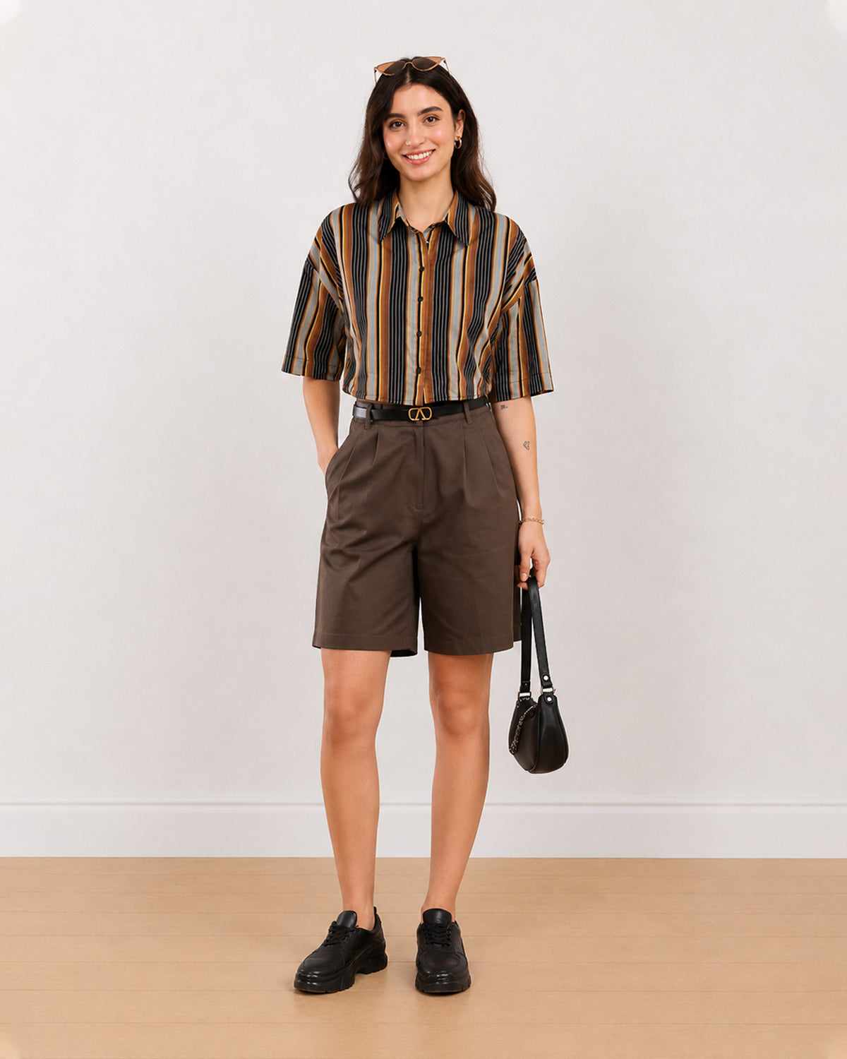 Cecil brown striped cropped shirt front detail showing straight cropped hem left untucked