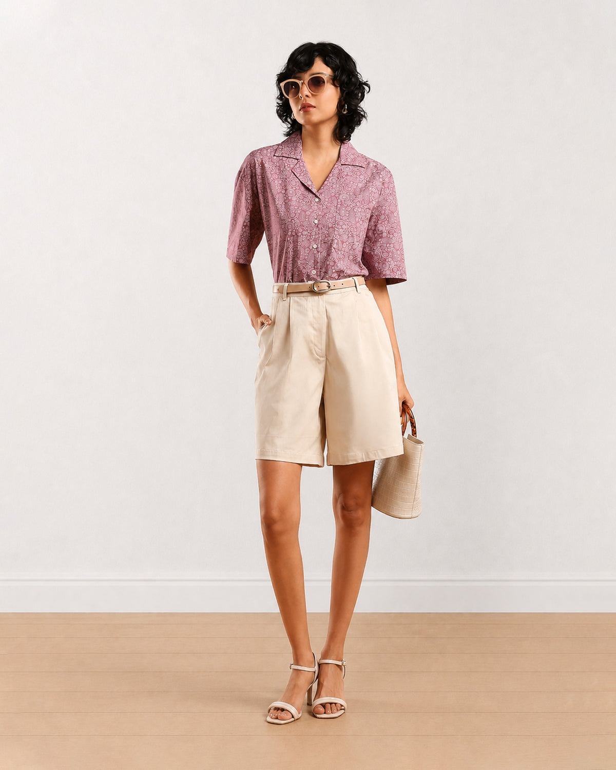 Celine beige knee length city shorts for women, front view with a loose fit
