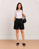 Celine black knee length city shorts for women, front view with a high waisted fit