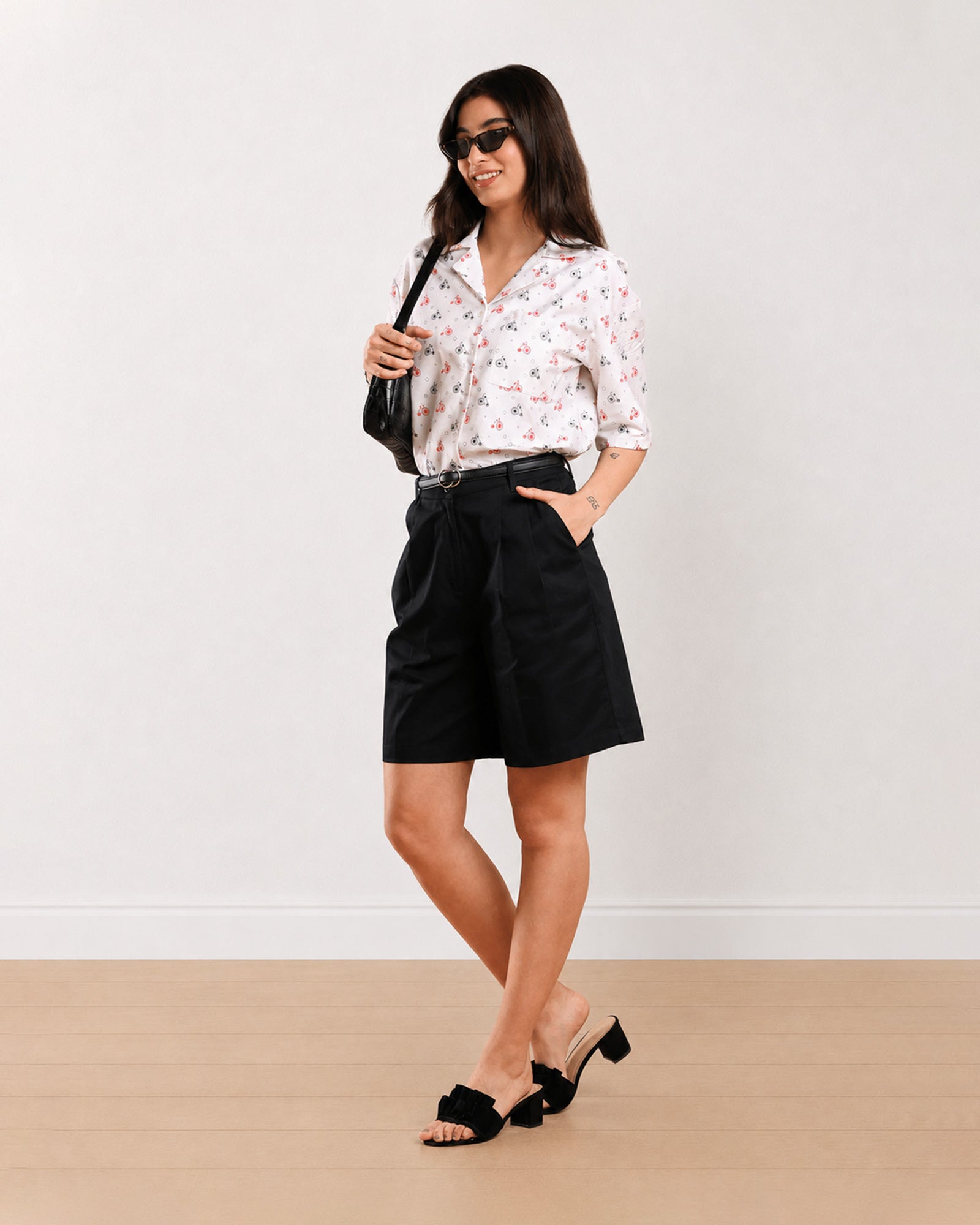 Gazillion Celine black knee length bermuda shorts for women, full-length front view