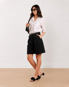 Gazillion Celine black knee length bermuda shorts for women, full-length front view