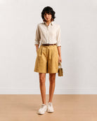 Celine camel beige knee length city shorts for women, front view with a loose fit