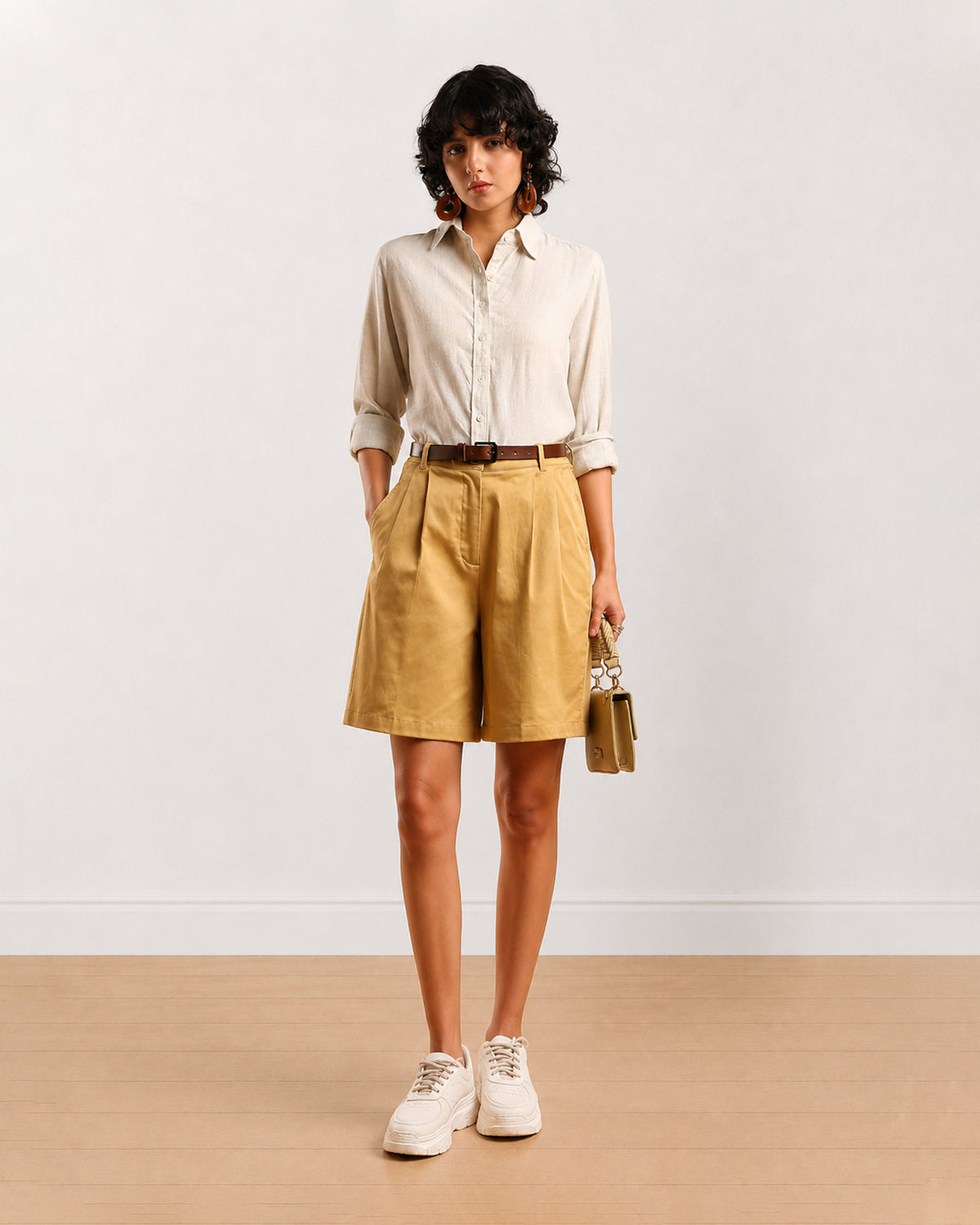 Celine camel beige knee length city shorts for women, front view with a loose fit