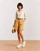 Gazillion Celine camel beige knee length bermuda shorts for women, full-length front view